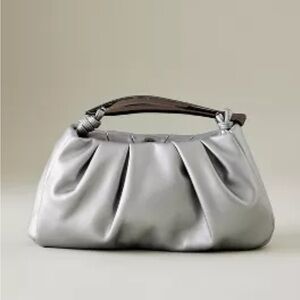 ASYMMETRICAL HARDWARE SATCHEL